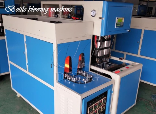 Bottle blowing machine